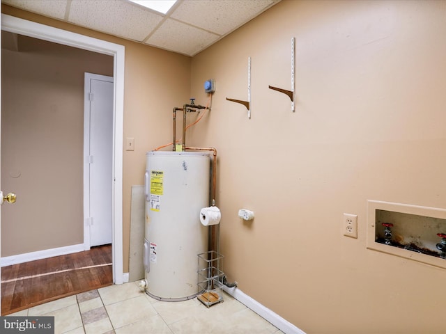 utility room with water heater