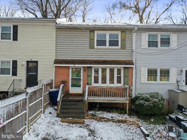 view of snow covered property