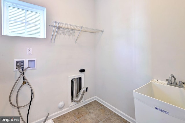 laundry room with washer hookup, gas dryer hookup, and sink