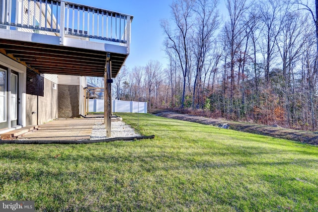 view of yard with a deck