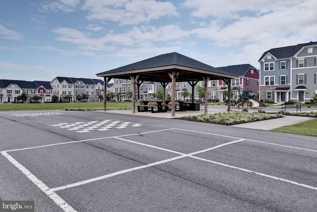 view of parking featuring a gazebo