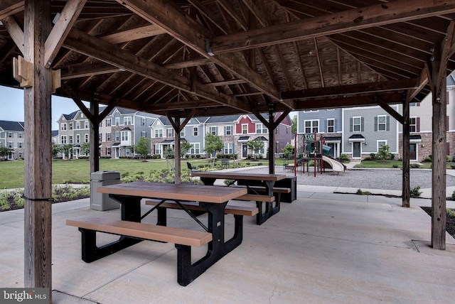 surrounding community with a gazebo, a playground, and a lawn