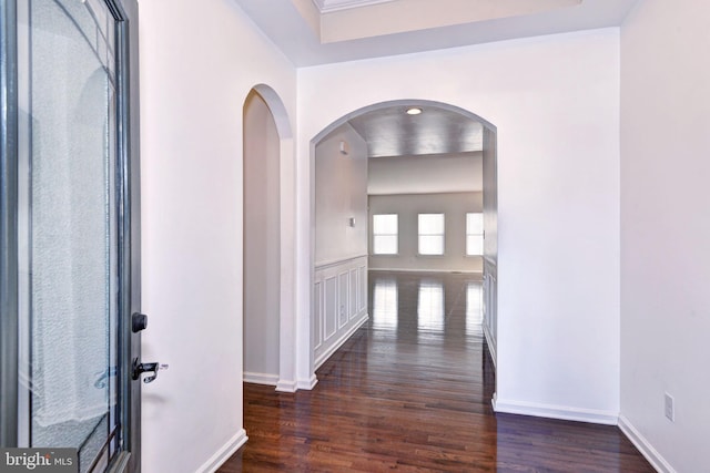 hallway featuring dark wood-type flooring