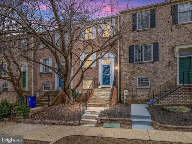 multi unit property featuring brick siding