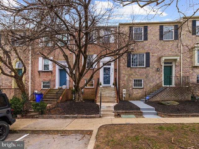 multi unit property featuring brick siding