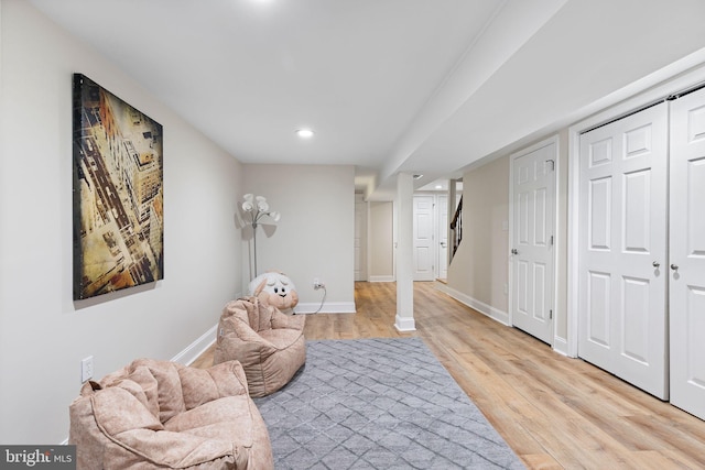 living area with light hardwood / wood-style floors