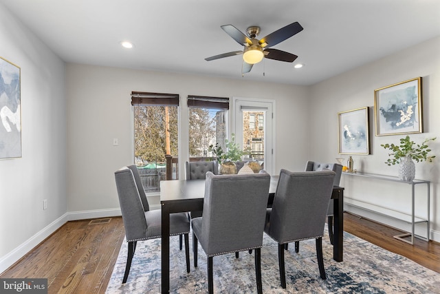 dining area featuring ceiling fan and hardwood / wood-style floors