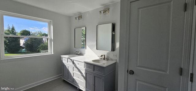 434 Redfern, Hamilton, NJ 08610 - full bath with tile patterned floors, double vanity, and baseboards