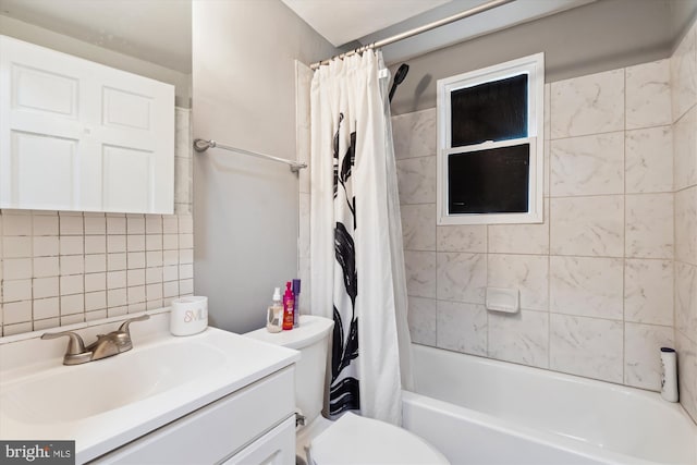 full bathroom featuring tasteful backsplash, shower / tub combo with curtain, vanity, and toilet