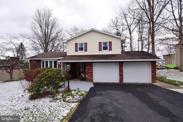 view of front of property featuring a garage