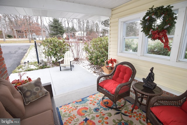 view of patio featuring a porch