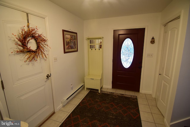 entrance foyer featuring a baseboard radiator and light tile patterned flooring