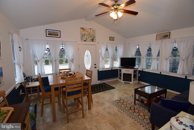 dining area with beamed ceiling, ceiling fan, baseboard heating, and high vaulted ceiling