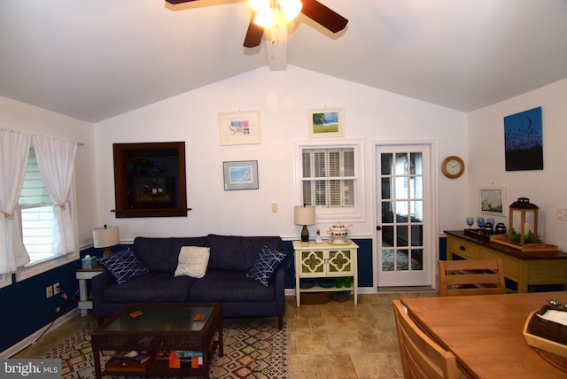 living room featuring lofted ceiling with beams and ceiling fan