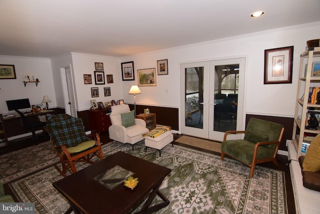 living room with french doors and crown molding