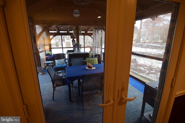 view of carpeted dining space