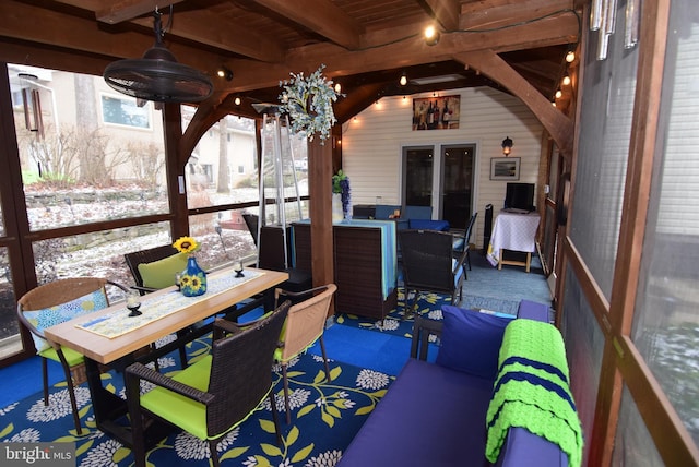 exterior space with french doors, an outdoor living space, and ceiling fan