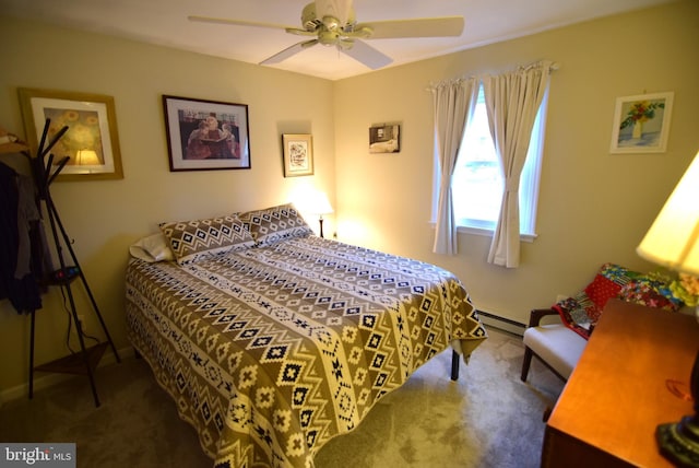 bedroom featuring carpet floors, baseboard heating, and ceiling fan