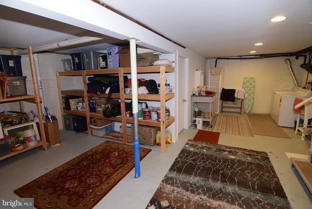 basement with washing machine and clothes dryer