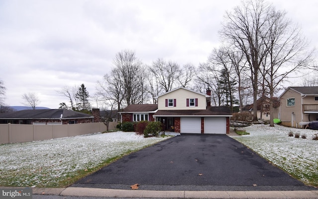 view of front of property featuring a garage