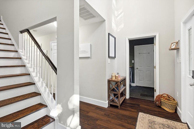 entryway featuring dark wood-type flooring