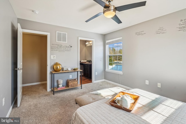 bedroom featuring connected bathroom, ceiling fan, and carpet