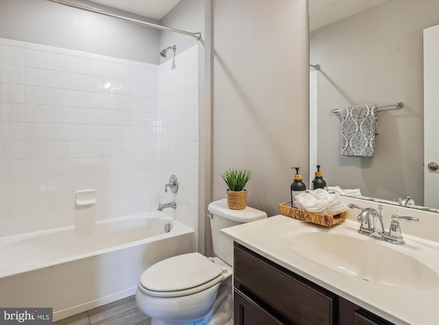 full bathroom with vanity, toilet, and tub / shower combination