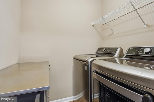 laundry area featuring washer and clothes dryer