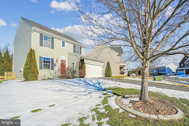 view of front of property with a garage