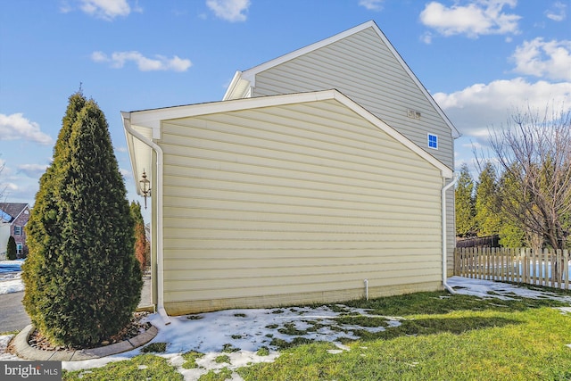 view of home's exterior featuring a yard