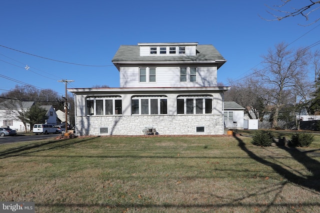 view of property with a front lawn