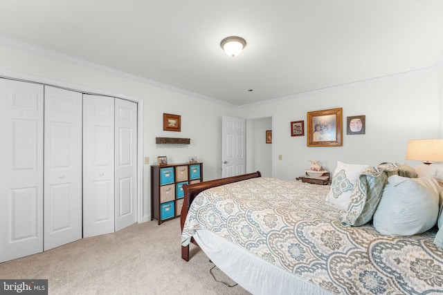 bedroom featuring ornamental molding, a closet, and light colored carpet