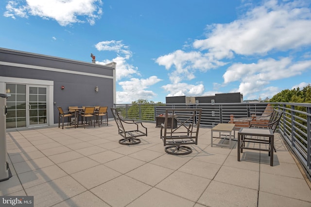 view of patio with a balcony