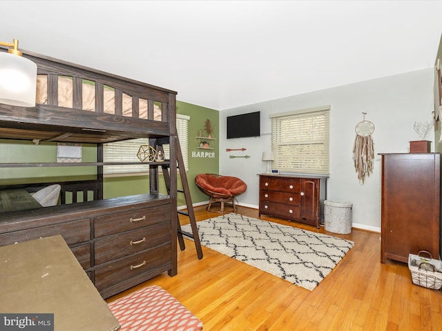 bedroom featuring light wood-type flooring