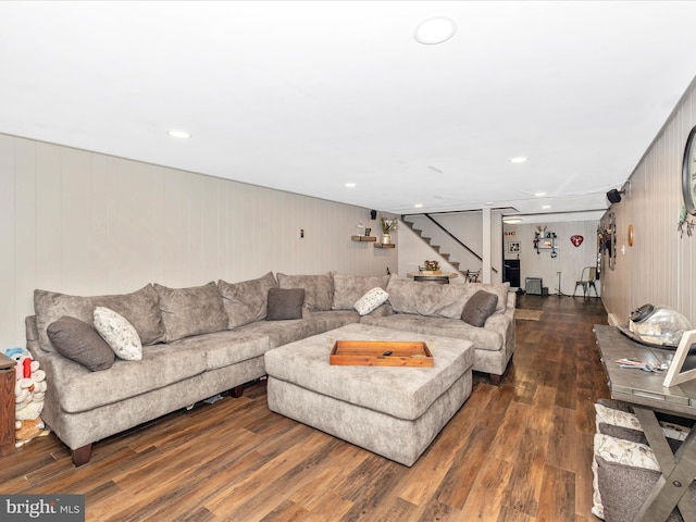 living room featuring dark wood-type flooring