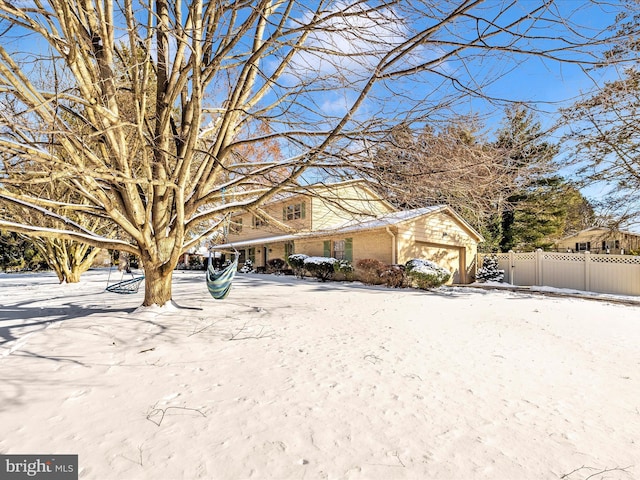 view of front of property featuring a garage