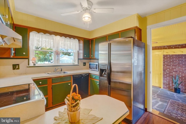 kitchen with appliances with stainless steel finishes, ceiling fan, and sink