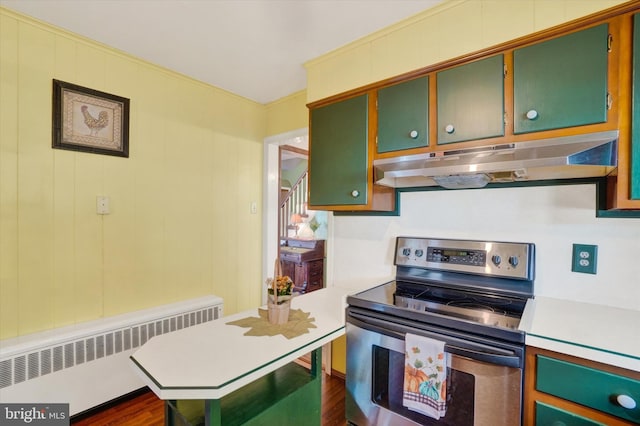 kitchen with stainless steel electric range oven, radiator heating unit, and dark wood-type flooring