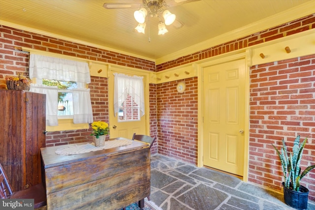 interior space featuring ceiling fan