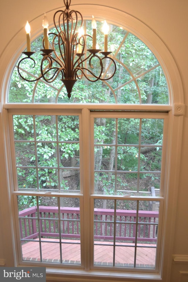 details with an inviting chandelier