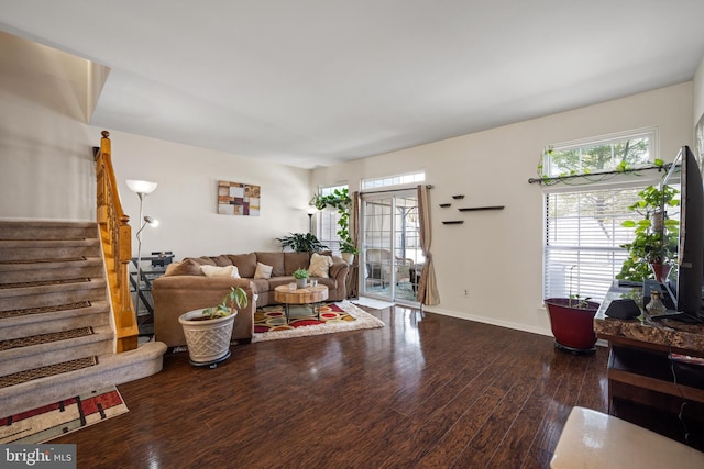 living room with dark hardwood / wood-style floors