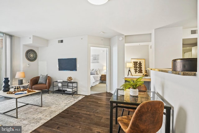 living room featuring dark hardwood / wood-style floors