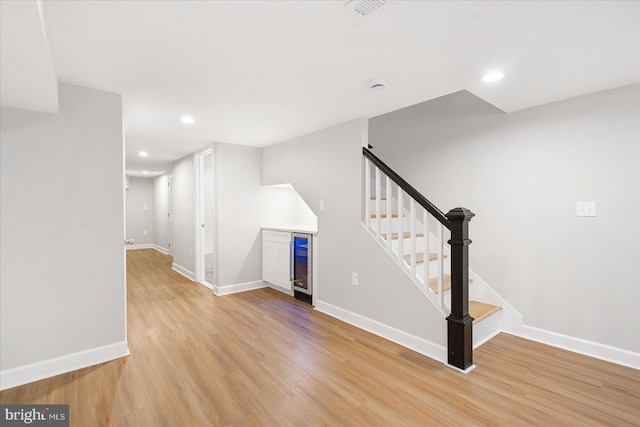 interior space featuring light wood-type flooring and wine cooler