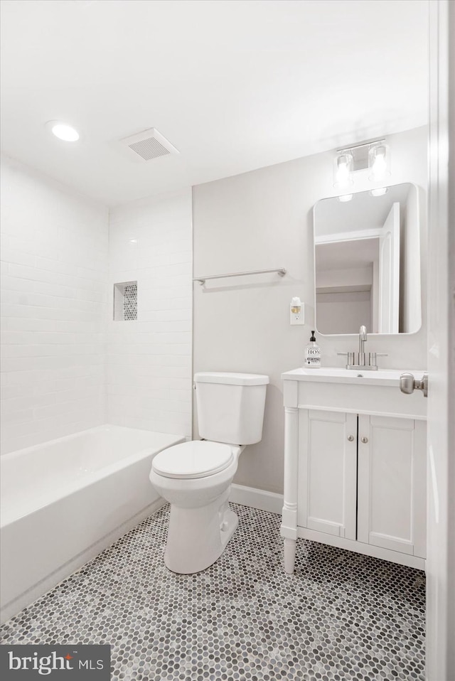 full bathroom with bathtub / shower combination, vanity, and toilet