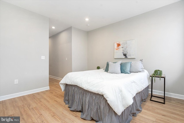 bedroom with light wood-type flooring