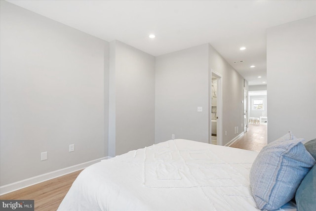 bedroom with light wood-type flooring