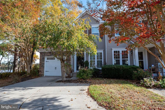 view of front of property with a garage