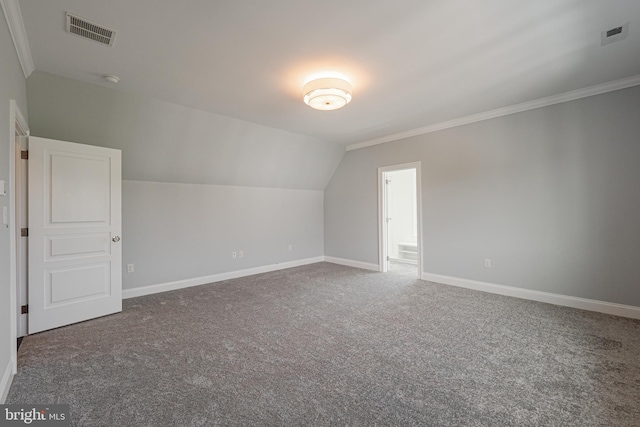 additional living space with lofted ceiling and carpet floors