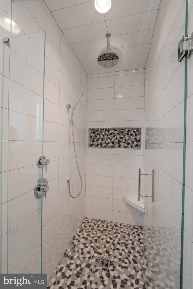 bathroom with an enclosed shower