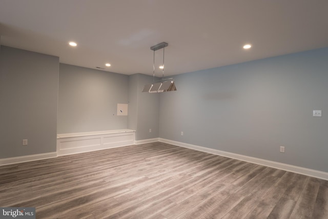 spare room featuring hardwood / wood-style flooring